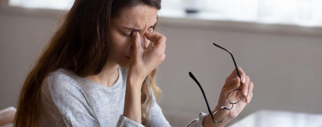 Insurance expert fighting fatigue after a long day 