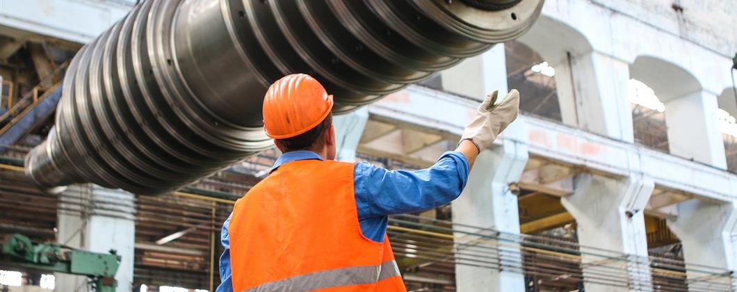 Manufacturing worker in a warehouse covered by Manufacturing insurance